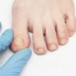 Young slim woman enjoys weight loss result